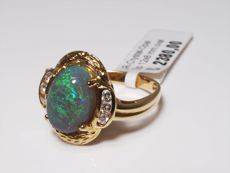 Opalschmuck, Goldring mit Kristallopal und Diamant